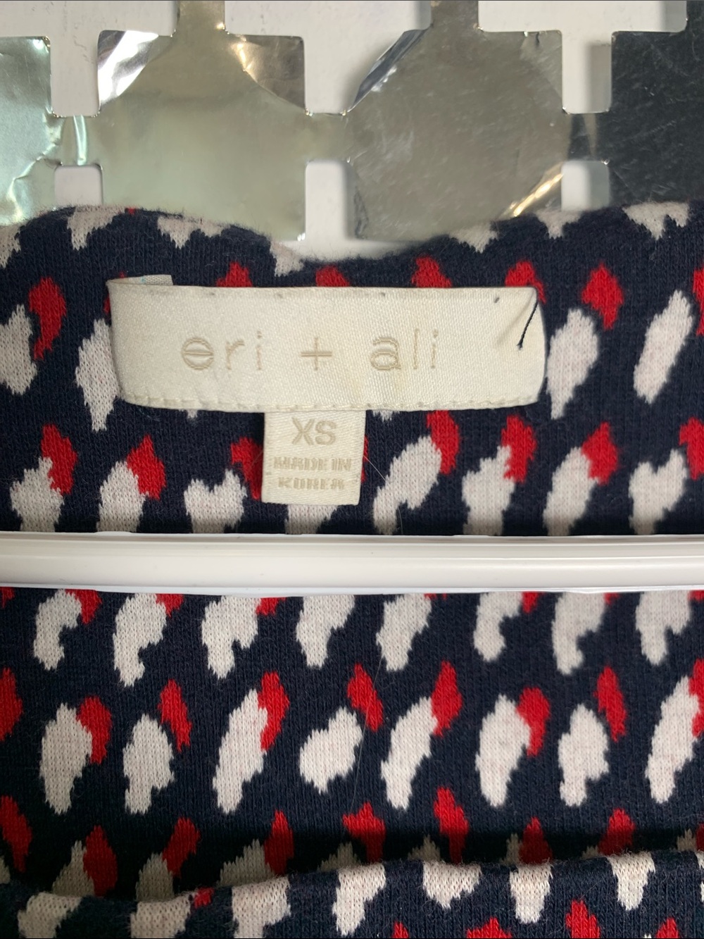 Eri + Ali Sleeveless Peplum Tank Top in Navy with Red & White Dot Pattern - Picture 2 of 4